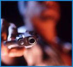 Close up of barrel of a pointed gun